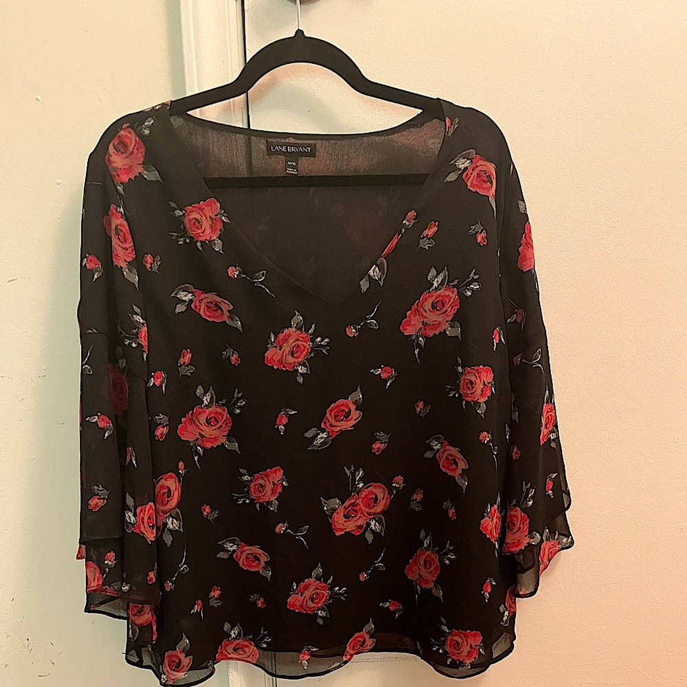 Lane Bryant flour print blouse with quarter bell sleeve. Like new